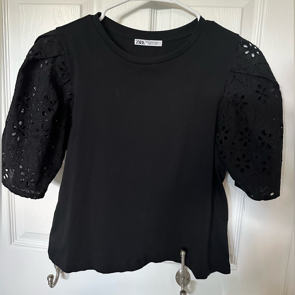Zara black short sleeve top, cropped- mid waist length. Eyelet sleeves